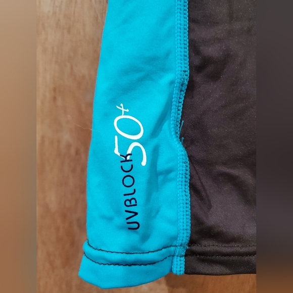 O'NEILL BROWN AND TEAL SHORT SLEEVE RASH GUARD SIZE SMALL - Picture 6 of 12